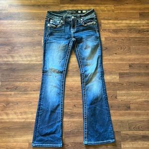 MissMe signature boot cut jeans with a bedazzled, pockets. Women’s size 26